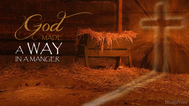 Manger scene with the radiant light of the Cross behind it.